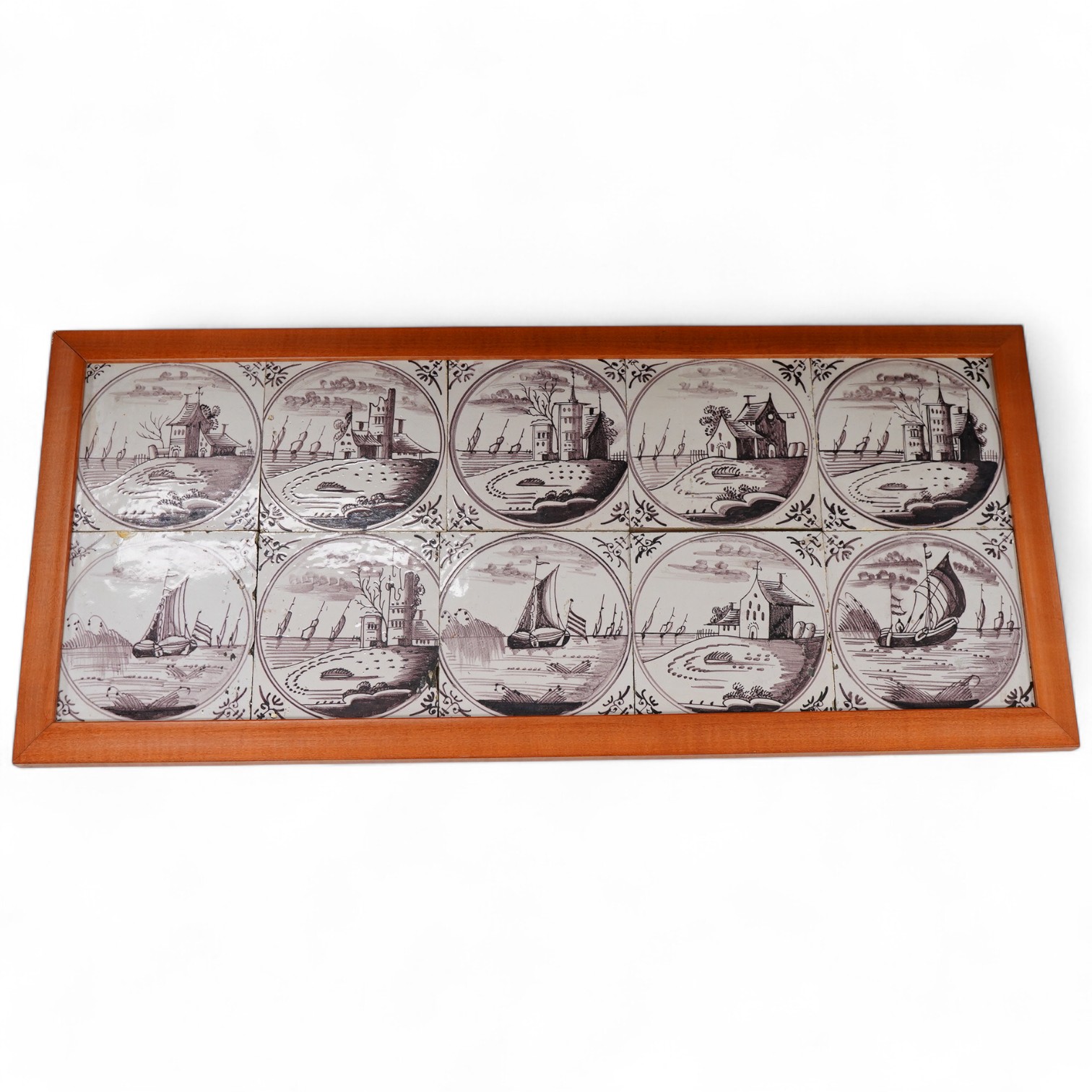 A set of ten framed delft tiles, 18th/19th century, overall 30 x 68cm